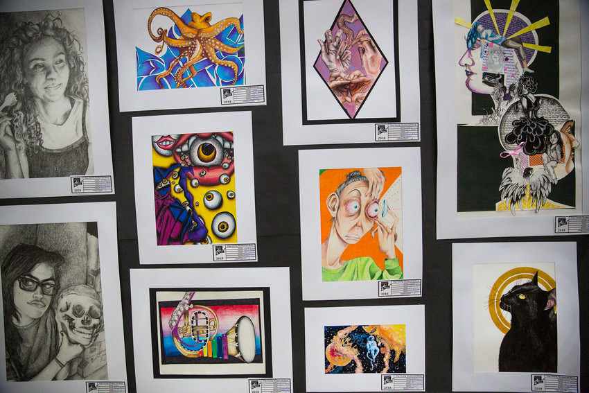 Photo by KILE BREWER
Art ranging from paintings and drawings to more involved sculpture and mixed media pieces hung during the annual student art show at the mall featuring work from schools throughout Clay County from high school all the way down to Kindergarteners' work.